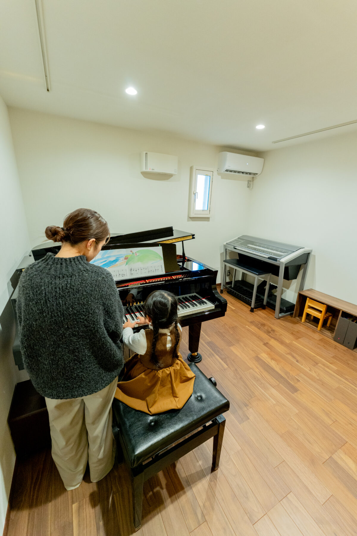 音楽教室を兼ねた注文住宅、「奏でる」と「くつろぐ」のハーモニー